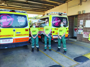 image of 3 female NT paramedics in front of ambulance vehicle